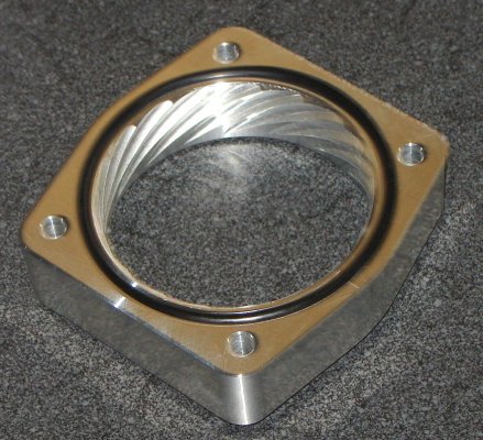 1188766079-throttle-body-spacer-review-tb-spacer-1.jpg