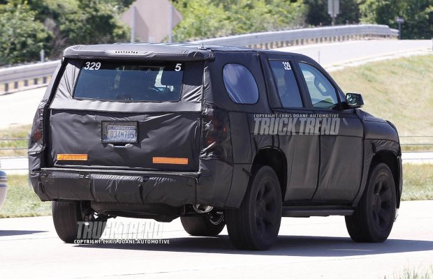 Spied-2014-Chevrolet-Tahoe-rear-view-in-motion.jpg