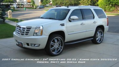 pearl-white-escalade-with-24-inch-dropstars.jpg