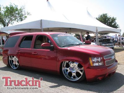 0907trweb_001_z+2009_texas_heatwave_truck_show+red_chevy_tahoe.jpg